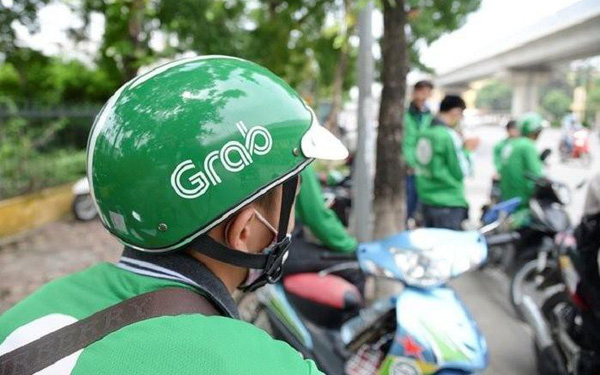 Grab ứng phó thế nào sau việc tài xế GrabBike chở nữ tiếp viên Vietnam Airlines dương tính với Covid-19? - Ảnh 1. Grab ứng phó thế nào sau việc tài xế GrabBike chở nữ tiếp viên Vietnam Airlines dương tính với Covid-19? - Ảnh 1.
