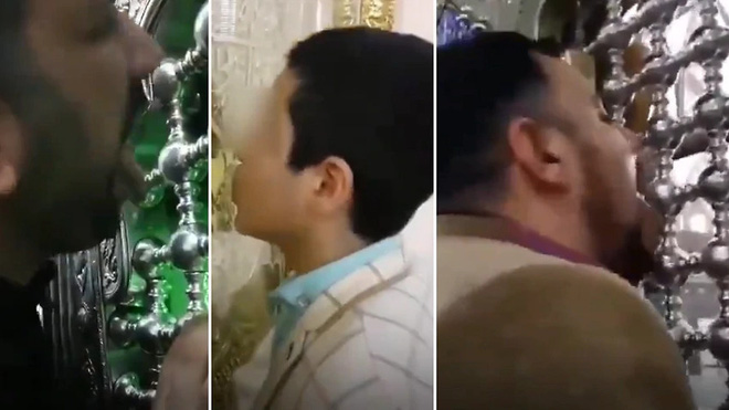 Người dân Iran tập trung liếm đền thờ giữa lúc dịch bệnh virus corona bùng phát - Ảnh 1. Người dân Iran tập trung liếm đền thờ giữa lúc dịch bệnh virus corona bùng phát - Ảnh 1.