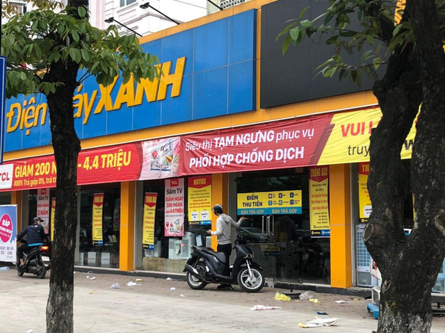 Các cửa hàng điện thoại, điện máy phải đóng cửa vì dịch Covid-19, nhà đầu tư bán tháo cổ phiếu Thế Giới Di Động - Ảnh 2. Các cửa hàng điện thoại, điện máy phải đóng cửa vì dịch Covid-19, nhà đầu tư bán tháo cổ phiếu Thế Giới Di Động - Ảnh 2.