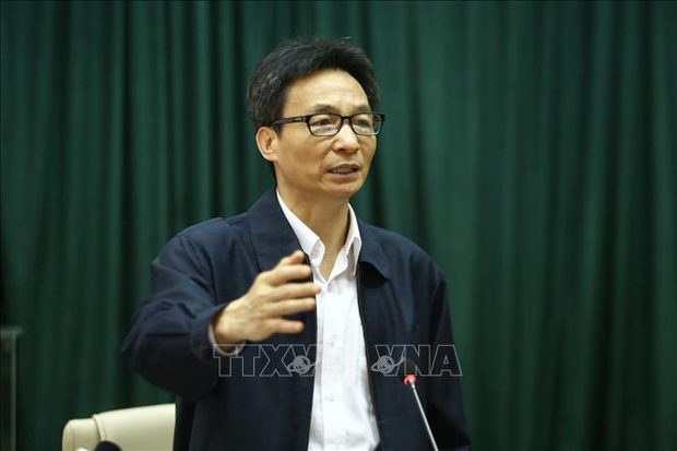 Ph&oacute; Thủ tướng Vũ Đức Đam: Muốn chiến thắng dịch COVID-19 cần sự đồng l&ograve;ng của to&agrave;n d&acirc;n - Ảnh 1.