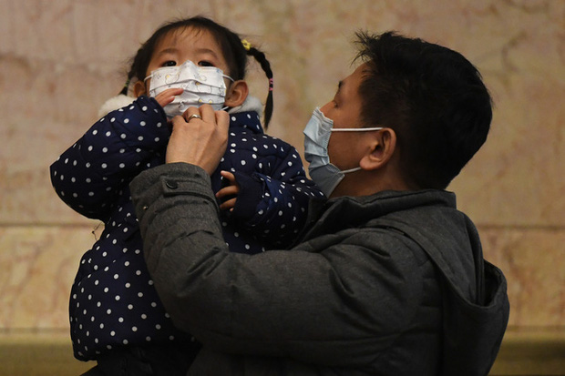 Khẩu trang, khử khuẩn, khoảng c&aacute;ch: Một kỳ Xu&acirc;n vận chưa từng thấy tại Trung Quốc dưới b&oacute;ng ma COVID-19 - Ảnh 16.