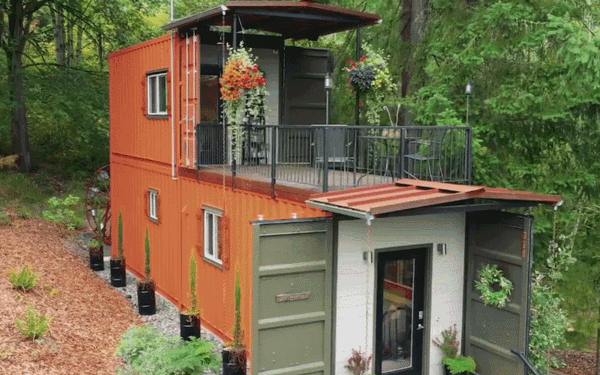 Kh&ocirc;ng mua nh&agrave; ở th&agrave;nh phố, một cặp vợ chồng dọn l&ecirc;n n&uacute;i, biến một chiếc container d&agrave;i 6 m&eacute;t th&agrave;nh biệt thự 2 tầng, sống một cuộc sống b&igrave;nh dị - Ảnh 1.