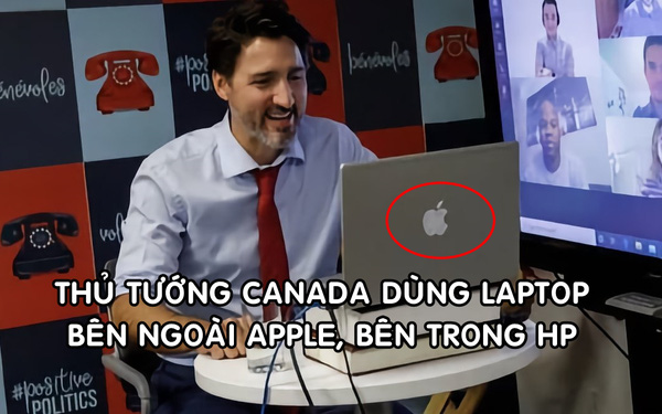 Thủ tướng Canada dùng laptop HP dán logo Apple để họp trực tuyến - Ảnh 1. Thủ tướng Canada dùng laptop HP dán logo Apple để họp trực tuyến - Ảnh 1.