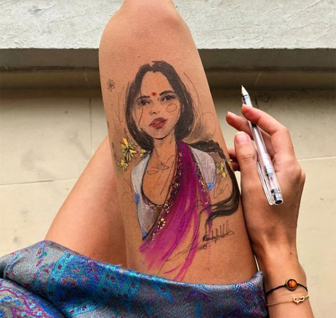 Lấy đùi làm tấm vải bố độc nhất vô nhị, nữ họa sĩ vẽ cho mình những tác phẩm nên thơ - Ảnh 1. Lấy đùi làm tấm vải bố độc nhất vô nhị, nữ họa sĩ vẽ cho mình những tác phẩm nên thơ - Ảnh 1.