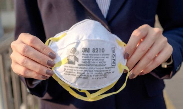 Ph&ograve;ng virus corona, người d&acirc;n c&oacute; cần mua khẩu trang chuy&ecirc;n dụng gi&aacute; 100.000 đồng/chiếc? - Ảnh 1.