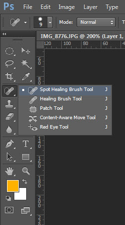 Công cụ Spot Healing Brush Tool.