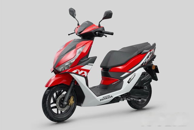 Honda hé lộ mẫu xe tay ga 125cc phong cách "quái thú" dùng động cơ eSP+ - Ảnh 4.