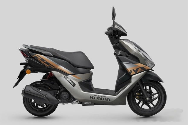 Honda hé lộ mẫu xe tay ga 125cc phong cách "quái thú" dùng động cơ eSP+ - Ảnh 2.
