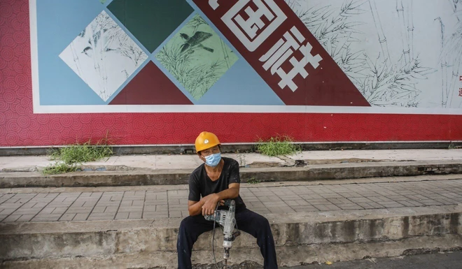 Con người dần vắng b&oacute;ng tại c&aacute;c d&acirc;y chuyền sản xuất Trung Quốc - Ảnh 3.