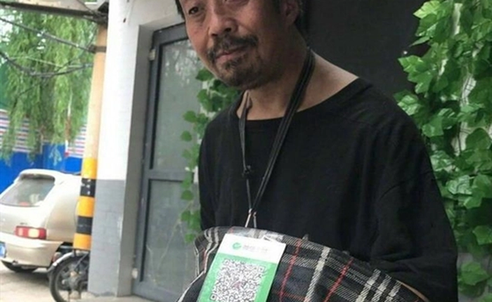 Người ăn xin tại Trung Quốc đang sử dụng QR Code như thế nào?